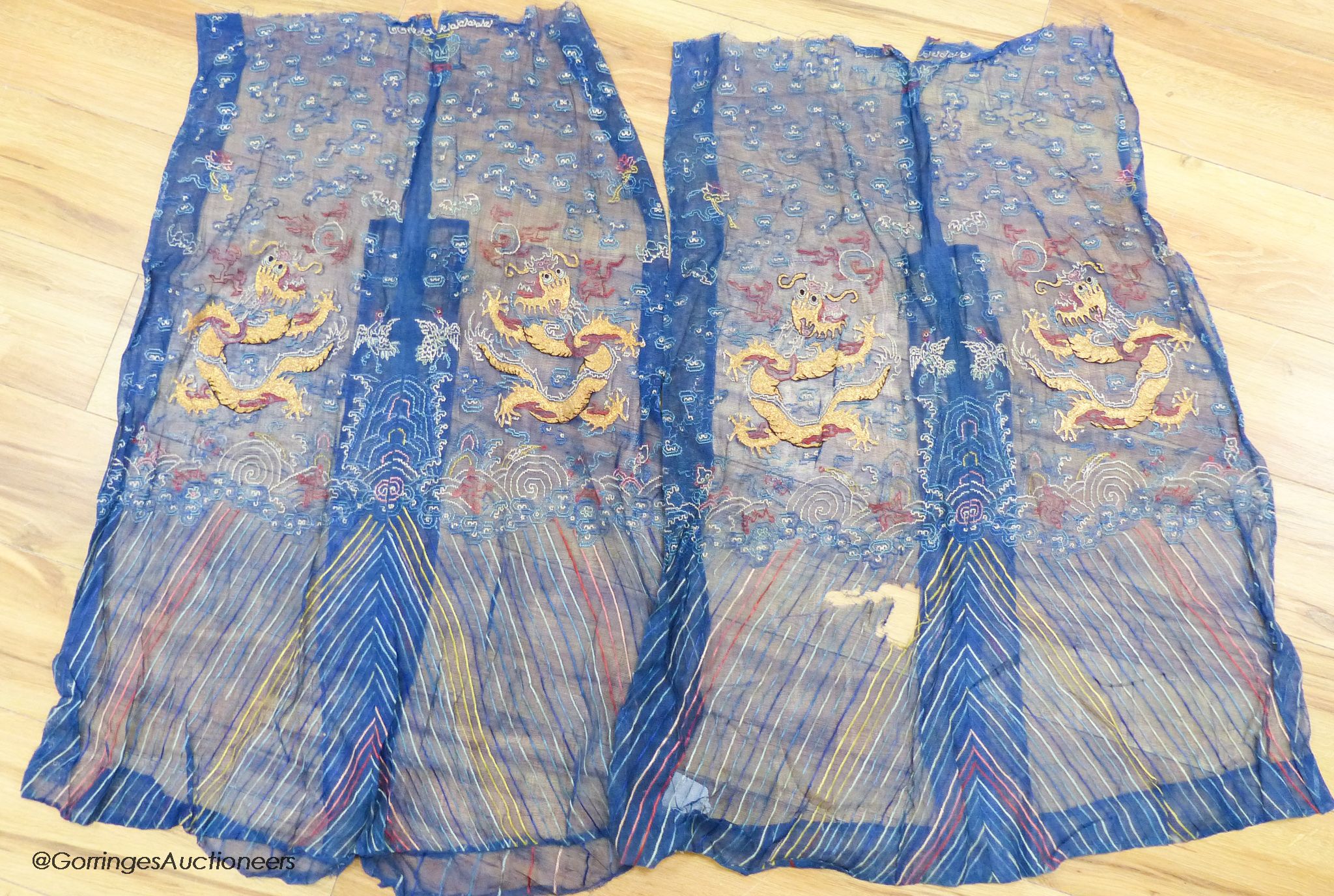 Two Chinese finely woven gauze panels with gold dragon embroidery, early 20th century